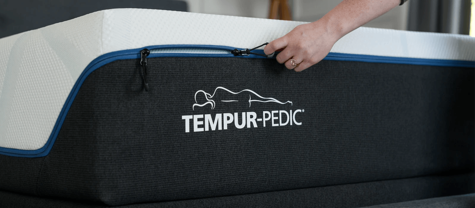 Replacement Cover with a hand unzipping the cover